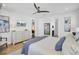 A nicely decorated bedroom with modern furniture and a ceiling fan at 2194 Cultura Cir, Mount Pleasant, SC 29466