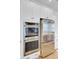 Modern kitchen features stainless steel appliances, including double ovens and a refrigerator at 2194 Cultura Cir, Mount Pleasant, SC 29466