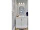 Chic powder room showcasing patterned wallpaper, modern lighting, and a stylish vanity with a vessel sink at 2194 Cultura Cir, Mount Pleasant, SC 29466