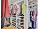 Organized walk-in closet featuring built-in shelving and ample hanging space for clothes and shoes at 2194 Cultura Cir, Mount Pleasant, SC 29466