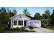 Charming single-story home featuring a black roof, white siding, a well-manicured yard, and an attached garage at 224 Callibluff Dr, Summerville, SC 29486