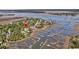 Scenic aerial view capturing waterfront property with docks and stunning natural surroundings at 2254 Beckenham Dr, Mount Pleasant, SC 29466