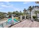 Enjoy the beautiful view of the backyard, pool, and waterfront from the deck at 2254 Beckenham Dr, Mount Pleasant, SC 29466