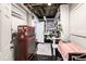 Organized basement with workbench, tool storage, and ample shelving for storage, offering a functional workspace at 2254 Beckenham Dr, Mount Pleasant, SC 29466