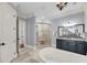 Modern bathroom with glass shower, soaking tub, and stylish vanity area at 2254 Beckenham Dr, Mount Pleasant, SC 29466