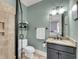 The bathroom features a granite vanity, neutral paint, a walk-in shower, and tile flooring at 2254 Beckenham Dr, Mount Pleasant, SC 29466