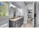 Double vanity bathroom featuring granite counters, tile floor, and view to exercise room at 2254 Beckenham Dr, Mount Pleasant, SC 29466