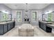 Luxury bathroom featuring a central tub, dual vanities, and elegant fixtures at 2254 Beckenham Dr, Mount Pleasant, SC 29466