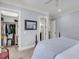 A secondary bedroom shows a closet and bathroom, along with neutral paint, carpet, and trim at 2254 Beckenham Dr, Mount Pleasant, SC 29466