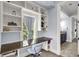 Cozy bedroom with a built-in desk, shelving and easy access to an ensuite bath at 2254 Beckenham Dr, Mount Pleasant, SC 29466