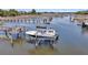 Boat on a lift, showcasing waterfront access and community amenities at 2254 Beckenham Dr, Mount Pleasant, SC 29466