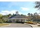 Community clubhouse with well-maintained landscaping and amenities, providing a welcoming gathering space for residents at 2254 Beckenham Dr, Mount Pleasant, SC 29466