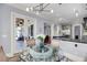 Light-filled dining area adjacent to kitchen and outdoor space at 2254 Beckenham Dr, Mount Pleasant, SC 29466