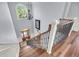 Grand foyer featuring a staircase with wood treads, iron railings, and a large window at 2254 Beckenham Dr, Mount Pleasant, SC 29466
