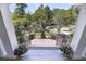 Stylish front entrance with tiled steps, iron railings, and columns overlooking the neighborhood at 2254 Beckenham Dr, Mount Pleasant, SC 29466