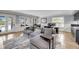 Comfortable living room with large sectional, area rug, and multiple windows at 2254 Beckenham Dr, Mount Pleasant, SC 29466