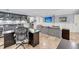 Well-appointed living room with a wet bar, desk, and comfortable seating area at 2254 Beckenham Dr, Mount Pleasant, SC 29466
