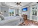 Main bedroom with beautiful hardwood floors, tray ceiling, and natural light at 2254 Beckenham Dr, Mount Pleasant, SC 29466
