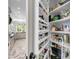 Walk-in pantry with custom shelving adjacent to the kitchen at 2254 Beckenham Dr, Mount Pleasant, SC 29466
