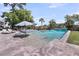 Backyard featuring a pool with lounge chairs, a hot tub, fountains and manicured greenery at 2254 Beckenham Dr, Mount Pleasant, SC 29466