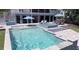 Relax by the gorgeous pool and spa, complete with umbrellas, lounge chairs, and shaded outdoor seating at 2254 Beckenham Dr, Mount Pleasant, SC 29466