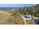 Stunning aerial view of a waterfront community featuring a pavilion and scenic nature trails at 2636 Colonel Harrison Dr, Johns Island, SC 29455