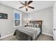 Bedroom with a ceiling fan, a window, a bedside table, and carpeted floors at 2636 Colonel Harrison Dr, Johns Island, SC 29455