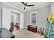 Bedroom with a surfboard and wooden chest, perfect for a beach-themed home at 2636 Colonel Harrison Dr, Johns Island, SC 29455