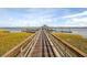 View of a long boardwalk leading to a community dock at 2636 Colonel Harrison Dr, Johns Island, SC 29455