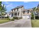 Beautiful home with a spacious driveway, two-car garage, and inviting front porch at 2636 Colonel Harrison Dr, Johns Island, SC 29455