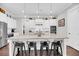 Spacious kitchen island with granite countertops, pendant lighting, and bar stool seating at 2636 Colonel Harrison Dr, Johns Island, SC 29455