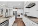 Beautiful kitchen with granite countertops, stainless steel appliances, and hardwood flooring at 2636 Colonel Harrison Dr, Johns Island, SC 29455