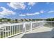 Balcony view overlooking a marina filled with boats, with a clear blue sky at 30 Yacht Harbor Ct, Isle of Palms, SC 29451