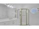 Bathroom features a walk-in shower, vanity with sink, and round porthole window at 30 Yacht Harbor Ct, Isle of Palms, SC 29451