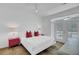 Bright bedroom featuring a large window, french doors, and side tables at 30 Yacht Harbor Ct, Isle of Palms, SC 29451