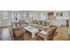 Bright living room with comfortable seating and access to the dining area at 30 Yacht Harbor Ct, Isle of Palms, SC 29451