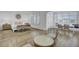 Relaxing bedroom featuring a sitting area, bench and a large bed with comfortable linens at 30 Yacht Harbor Ct, Isle of Palms, SC 29451