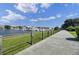 Scenic waterfront view with a walking path at 30 Yacht Harbor Ct, Isle of Palms, SC 29451