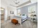 Serene primary bedroom featuring a tray ceiling, plush carpet, and bright window with nice views at 3061 Cross Vine Ln, Summerville, SC 29483