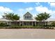 Community clubhouse with a charming facade, well-manicured landscaping, and ample parking for residents at 3061 Cross Vine Ln, Summerville, SC 29483