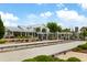 Community clubhouse area with bocce ball courts, seating, and outdoor amenities for residents to enjoy at 3061 Cross Vine Ln, Summerville, SC 29483