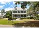Charming two-story home with inviting front porch and well-maintained landscaping at 3061 Cross Vine Ln, Summerville, SC 29483