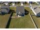 Aerial view of a home with a fenced yard and patio furniture on the screened-in porch at 312 Cypress Branch Rd, Huger, SC 29450