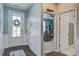Bright entryway with wainscoting and view into office at 312 Cypress Branch Rd, Huger, SC 29450