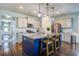 Modern kitchen with island, pendant lighting, and stainless steel appliances at 312 Cypress Branch Rd, Huger, SC 29450