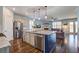 Open-concept kitchen with granite countertops and stainless steel appliances at 312 Cypress Branch Rd, Huger, SC 29450