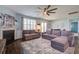 Spacious living room with a ceiling fan, comfortable seating, and a view to a dining area at 312 Cypress Branch Rd, Huger, SC 29450