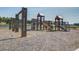 Community playground for children with swings, slide, and climbing structure in a safe and fun environment at 312 Cypress Branch Rd, Huger, SC 29450