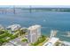 An aerial view shows this waterfront community, the harbor, and the Ravenel Bridge at 330 Concord St # 4A, Charleston, SC 29401