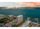 Enjoy waterfront living! Aerial view of the community, harbor, and bridge at 330 Concord St # 4A, Charleston, SC 29401